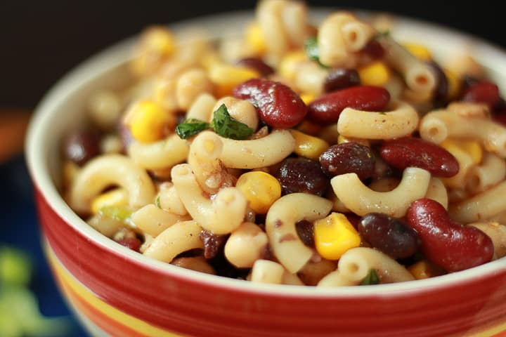 Mexican Pasta Salad in a colorful bowl zoomed in photo. 