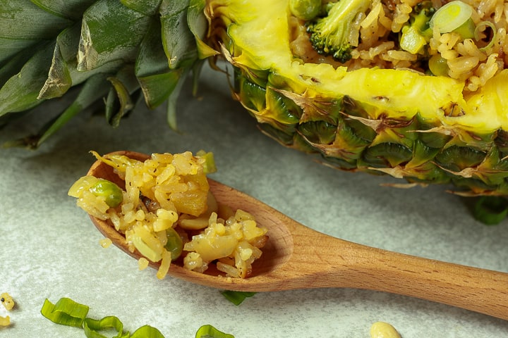 vegan pineapple rice on a spoon