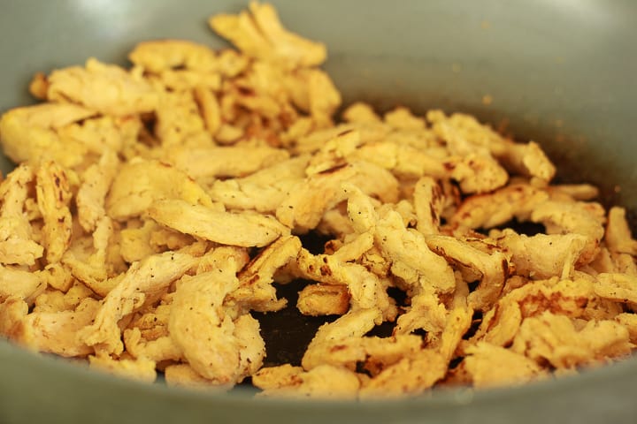 soy curls cooked in a frying pan. 
