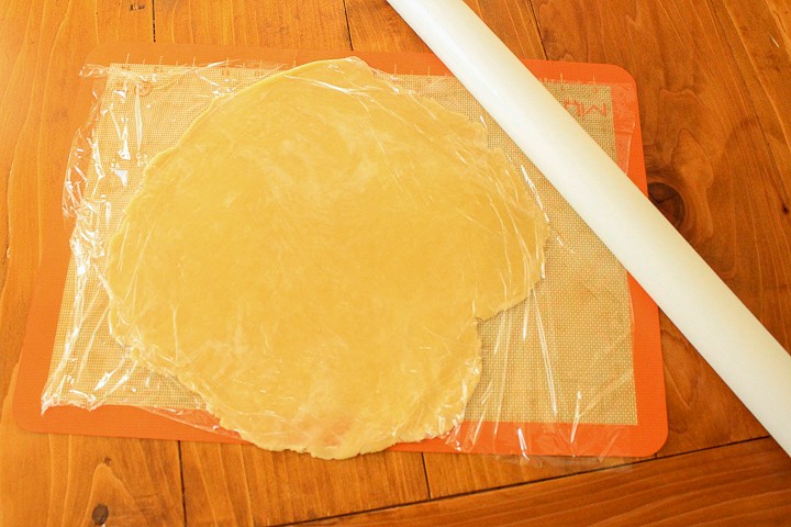 rolling out vegan pie crust dough
