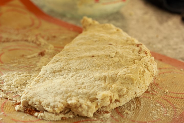 folding vegan biscuit dough