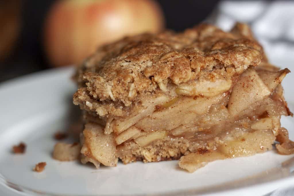 vegan apple crisp on a white plate. 