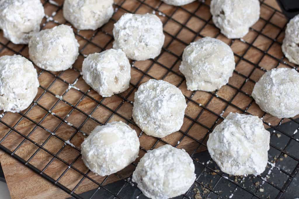 snowball cookies on a rack