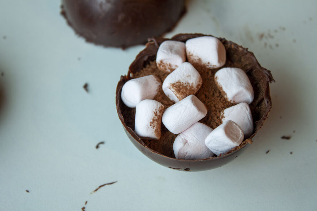 hot cocoa sphere filled with vegan hot chocolate and marshmallows