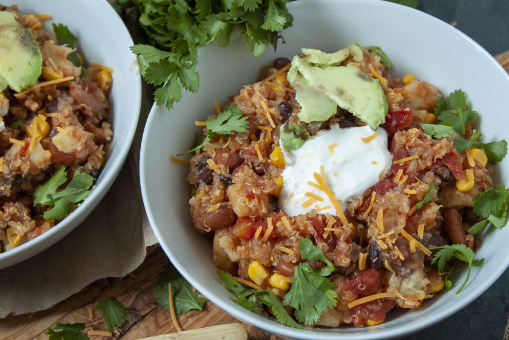 Plated vegan sweet potato chili in two bowls next to each other.