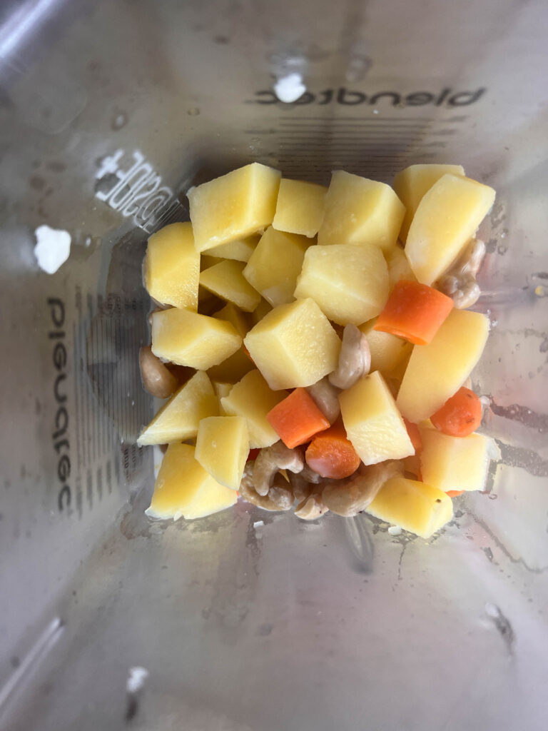 vegan nacho cheese ingredients in the blender before blending. 
