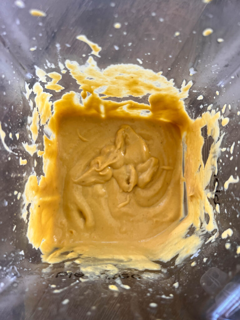 vegan nacho cheese blended in the blender. 