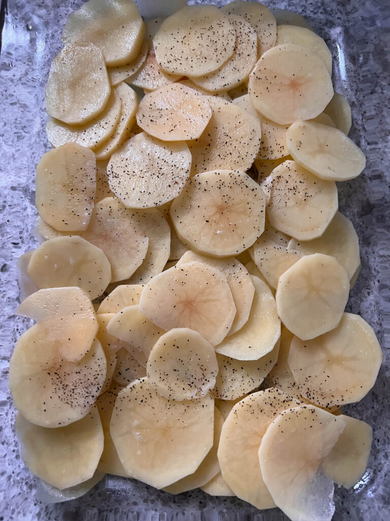 sliced vegan scalloped potatoes
