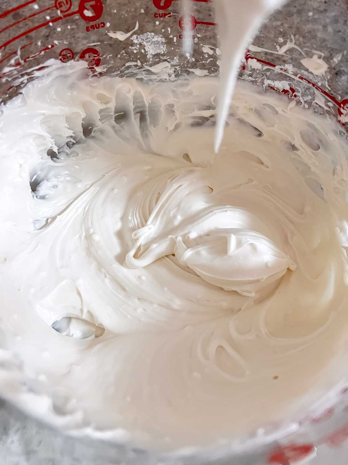 Vegan cream cheese frosting in a bowl. 