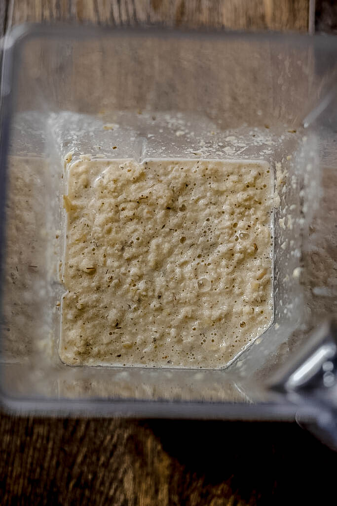 All the vegan ricotta ingredients blended in a blender. 